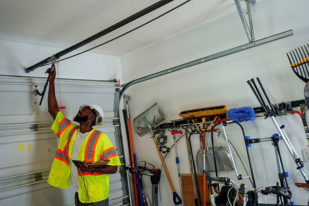 Professional Garage Door Panel Replacement technician working in Eclectic, AL